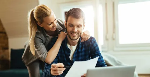 Couple looking at mortgage application