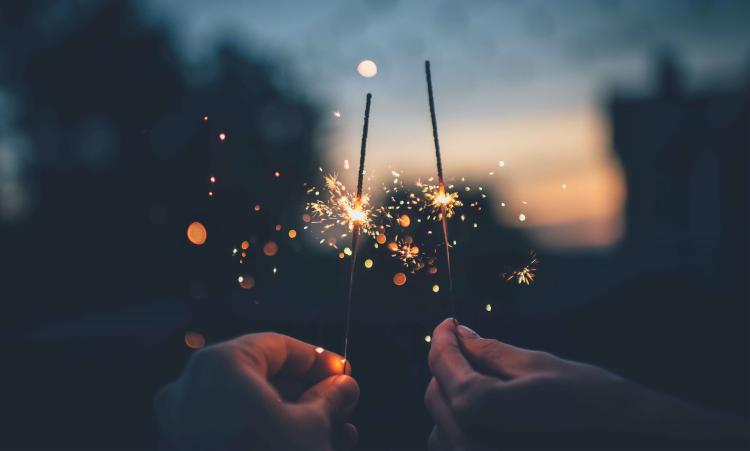 People safely using sparklers on bonfire night