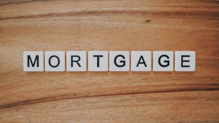 Mortgage spelled out in scrabble tiles